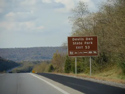 Police search for suspect in killing of couple hiking with their 2 children in Arkansas park