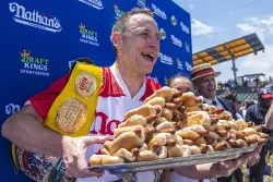 Joey Chestnut will return to the Coney Island hot dog contest after last year's beef