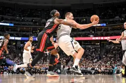 Nikola Jokic dominates in Nuggets’ 122-112 win over Heat — Denver stays perfect at home