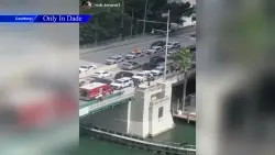 Woman hospitalized after attempting to cross Brickell bridge as it opened