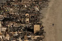 As wildfires scorch California, should insurers divest from fossil fuels?