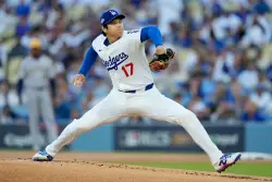 Shohei Ohtani hits 3 homers and strikes out 10 in Dodgers' clinching 5-1 NLCS win over Brewers