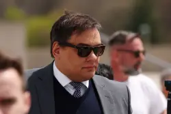 Former Rep. George Santos released from prison after Trump commutes his sentence