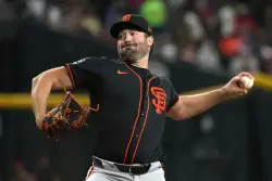 Ray throws second career complete game as SF Giants split series in Arizona