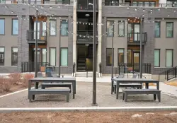 Gov. Jared Polis signs law that will bring more single-stair apartment buildings to Denver