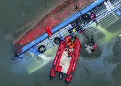 Tourist boats capsize in sudden storm in southwest China, leaving 10 dead